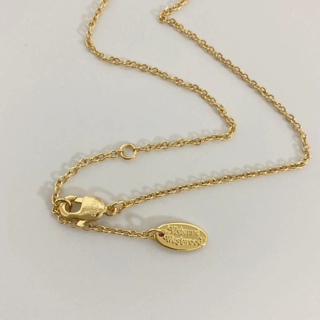 Authentic Vivienne Westwood Petra Necklace Gold Shell Heart