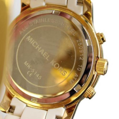 Cow Opiate torture michael kors watch 