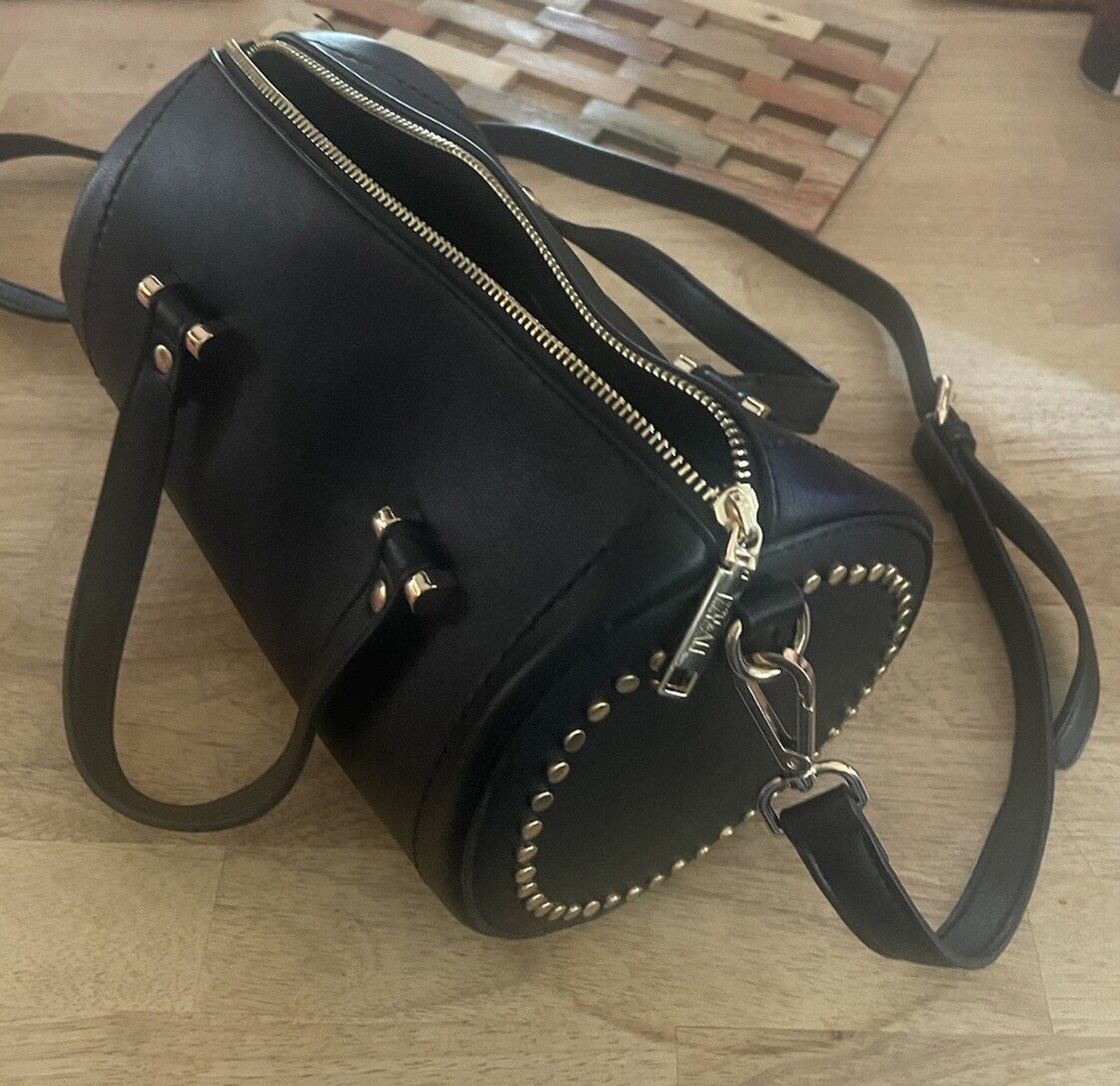 Izzy and Ali sleek black barrel purse with premium leather