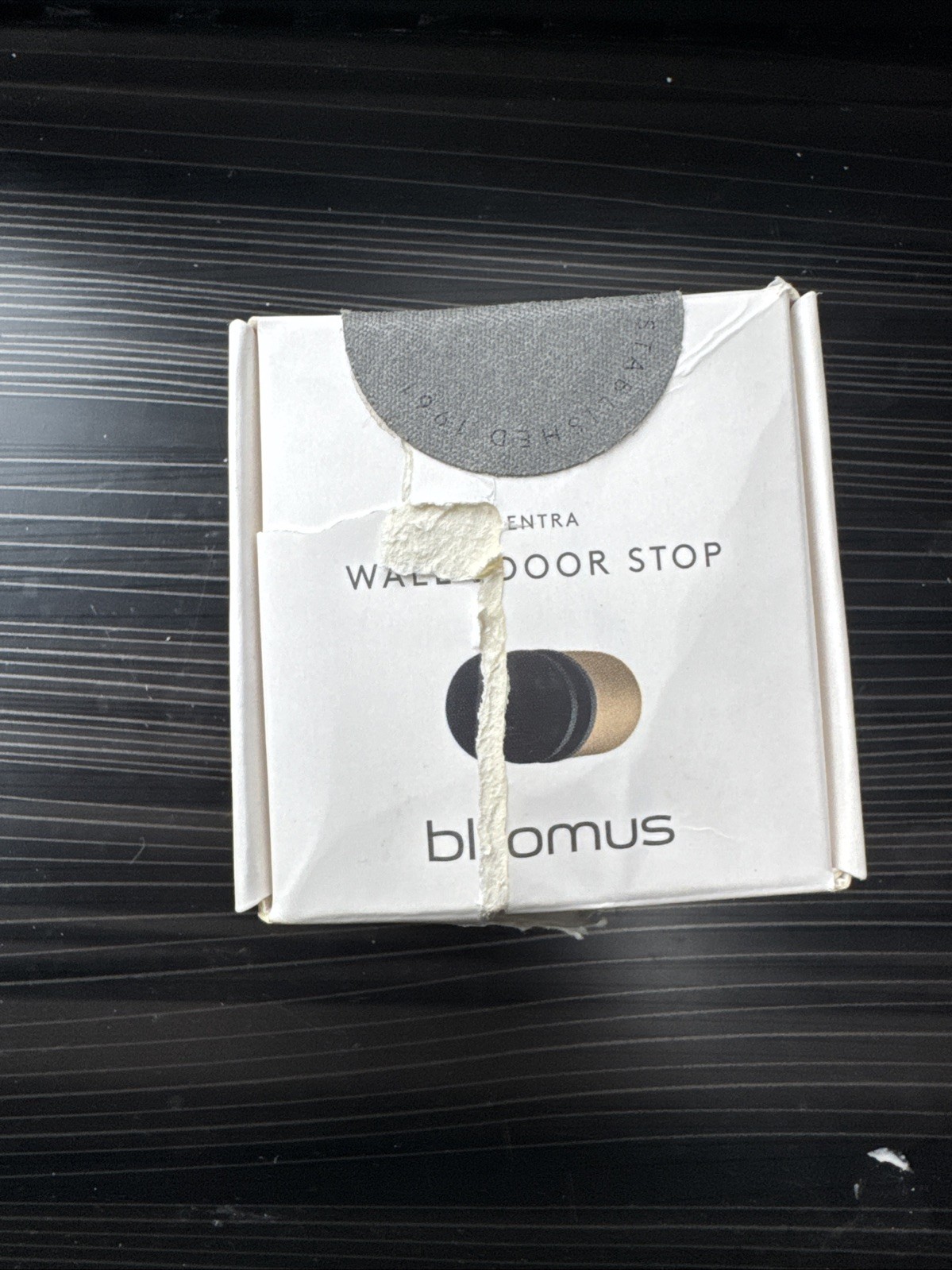 Blomus Entra Brass Wall Door Stops With Metallic Finish