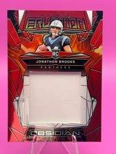 2024 Panini Obsidian #ERM-JBS Jonathon Brooks Rookie Eruption Materials Red #/75