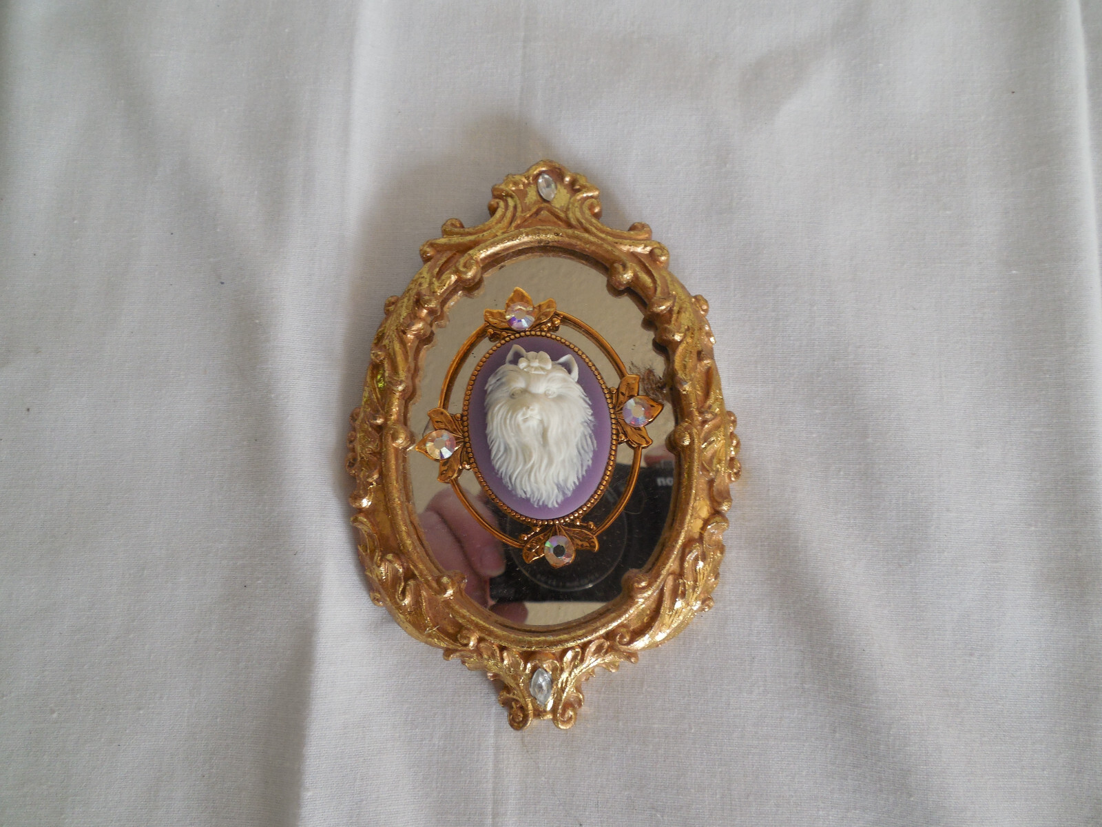 Mounted gold tone Yorkie brooch in gold Florentine frame repurposed**