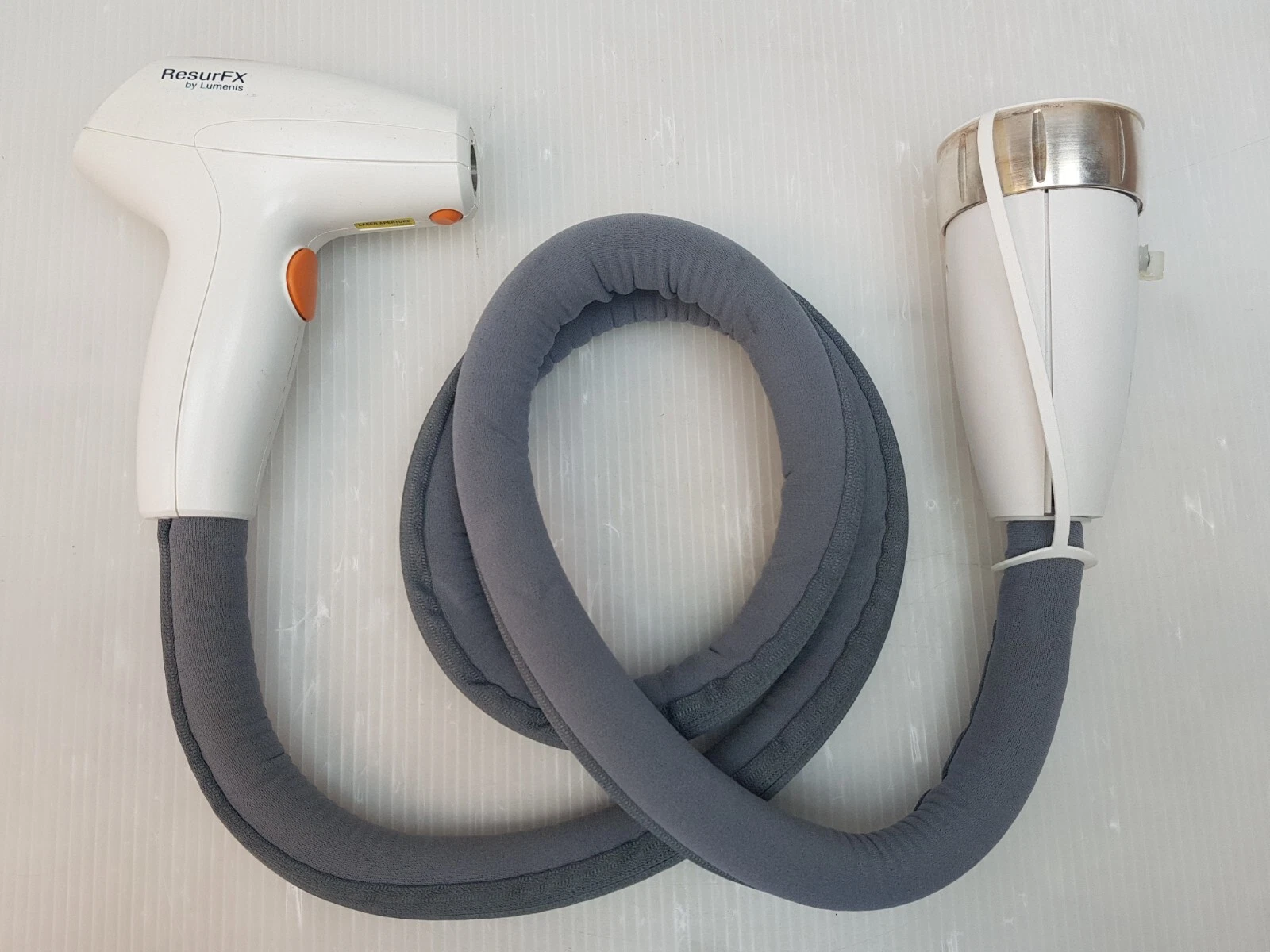 ResurFX by Lumenis handpiece with grey umbilical cable and console connector