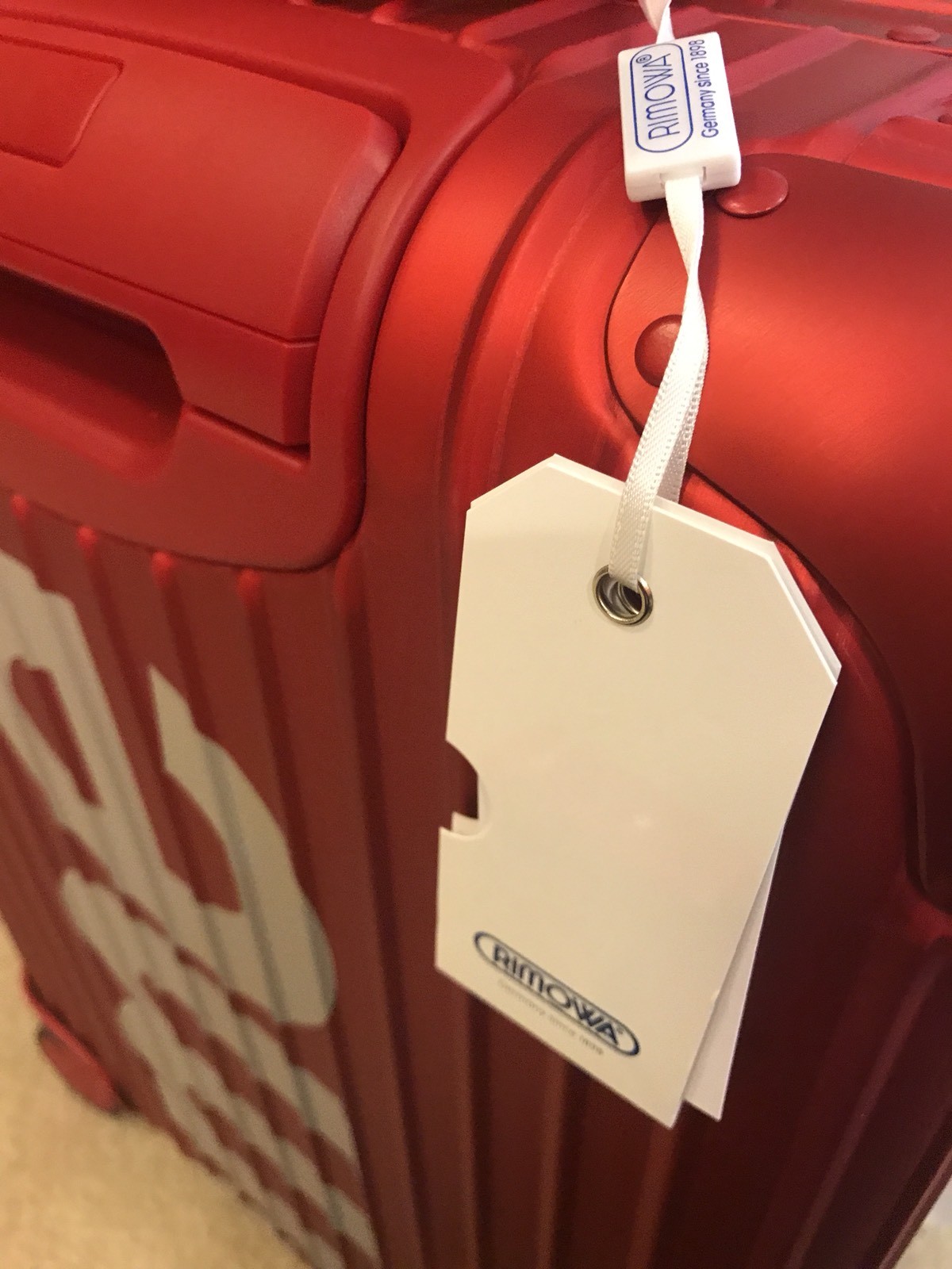 supreme rimowa topas multiwheel 45l red