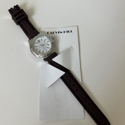 Calvin Hill brand Quartz wristwatch with a brown rubber strap.