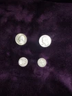 (2) 1964 Silver Quarters (1) 1951Silver Dime (1) 1962canada Dime All Circulated