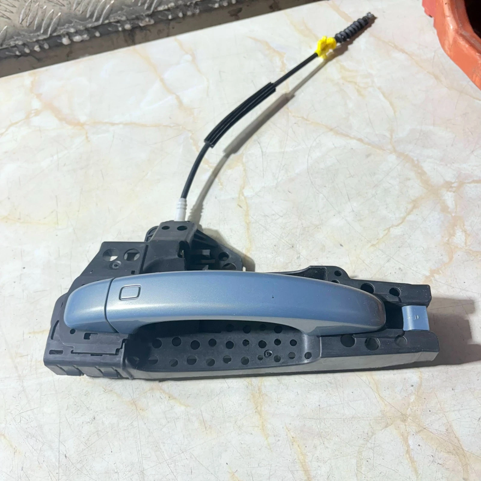 Audi A4 B9 rear left exterior door handle with carrier and cable