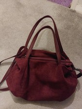 Burgundy suede handbag