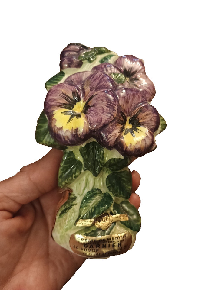 A petite French ceramic Crème de Menthe decanter from P. Garnier with stunning 3D purple violet relief — the kind of thing antique shops charge triple for.