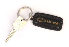 Vintage 90s Oldsmobile Company Logo Metal Promo Keychain With GM Key Made In USA