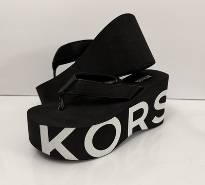 MICHAEL Michael Kors Women s Benny Wedge Black & White Graphic Logo Flip-Flop 8