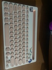 Wireless Bluetooth pink and white keyboard, with fresh new battires included