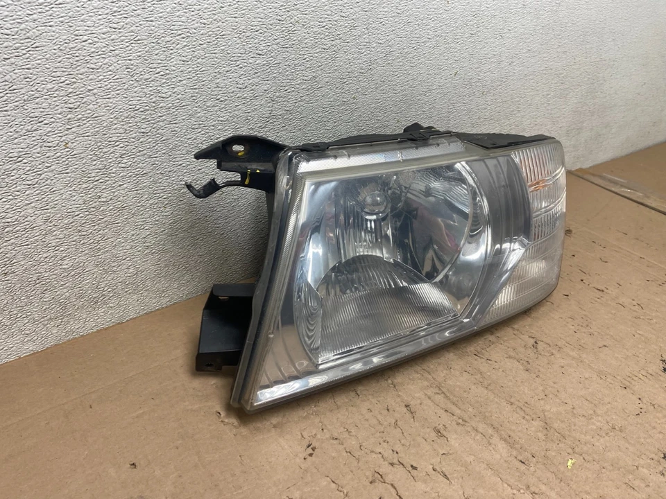 Faro halógeno lateral derecho conductor izquierdo Mitsubishi Montero 2003 a 2006 R3266 DW Foto 3 de 4