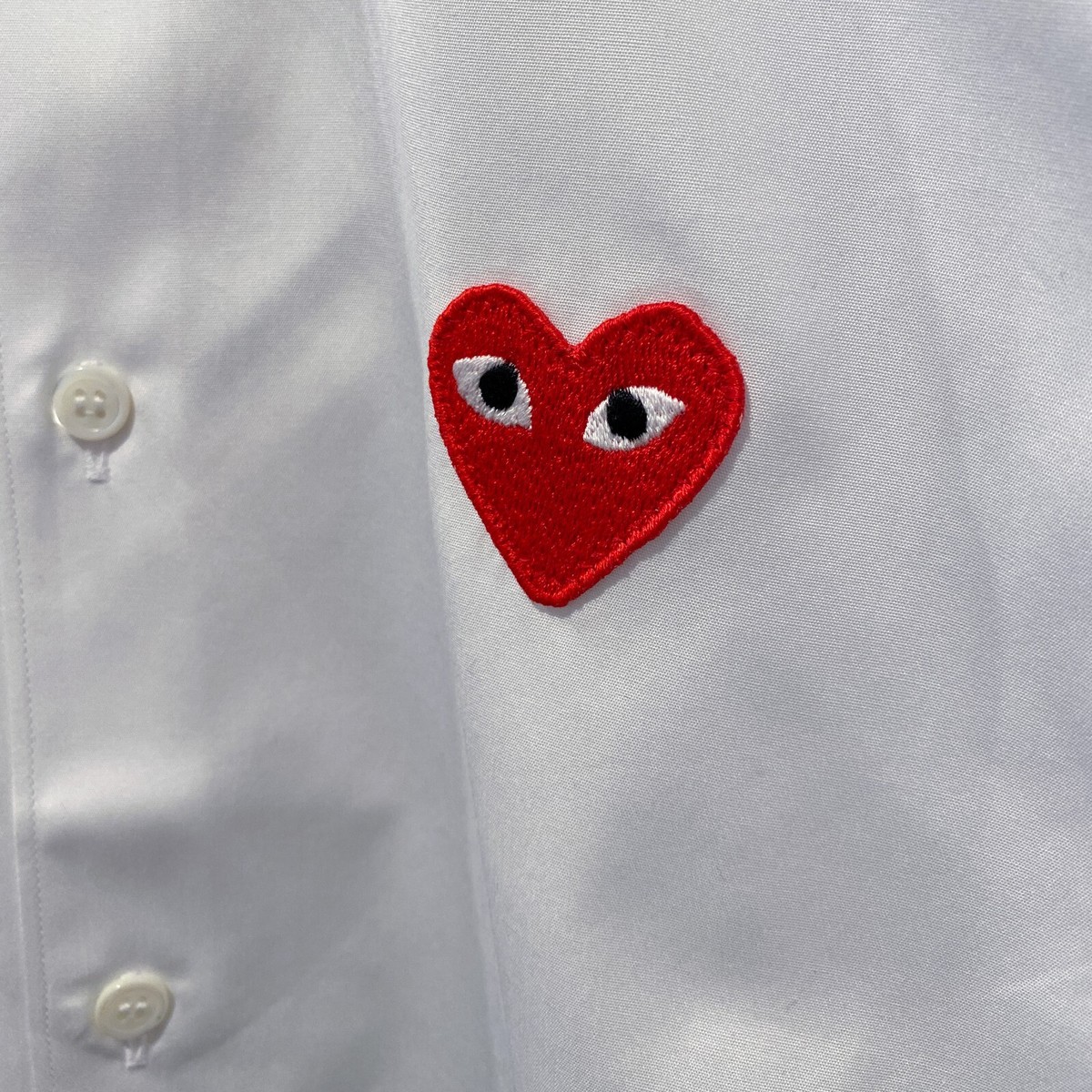 COMME DES GARCONS CDG PLAY RED EMBLEM BUTTON DOWN LS SHIRT COMME DES GARCONS CDG PLAY RED EMBLEM BUTTON DOWN LS SHIRT