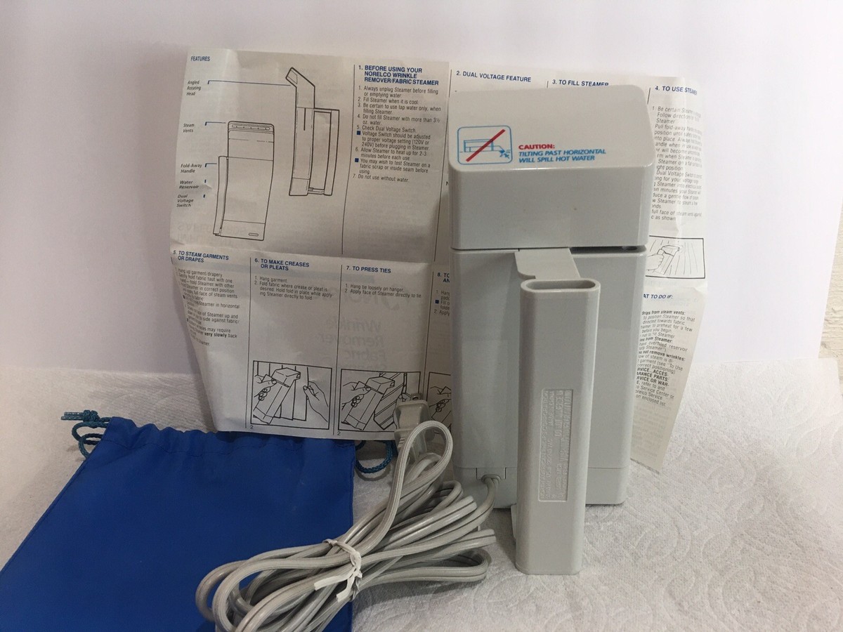 Norelco TS-60 Fabric Steamer/Wrinkle Remover 120/240V W/Travel Bag