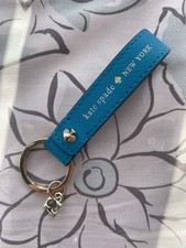 Kate Spade New York turquoise blue leather keyring bag charm “Live Colorfully”