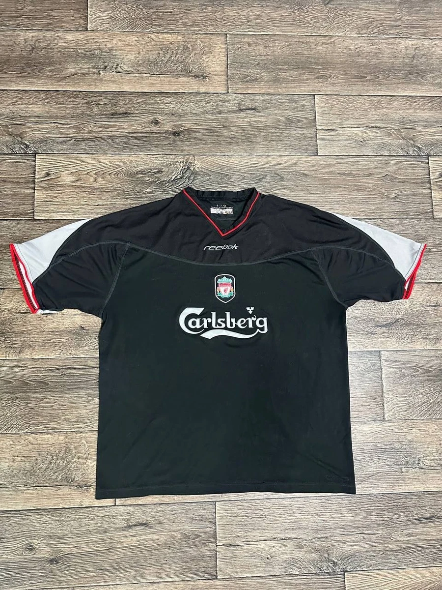 Preços baixos em Reebok Liverpool Preto Clube Internacional de