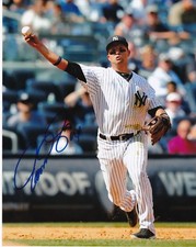 MARTIN PRADO  NEW YORK YANKEES   ACTION SIGNED 8x10