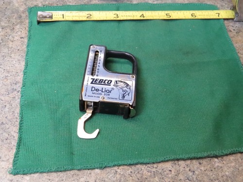 Vintage Zebco Fisherman's De-Liar Model 208 Tape Measure Weight Scale USA