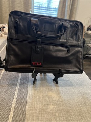 Tumi Men s Large black heavy duty leather briefcase /laptop bag .Never Used