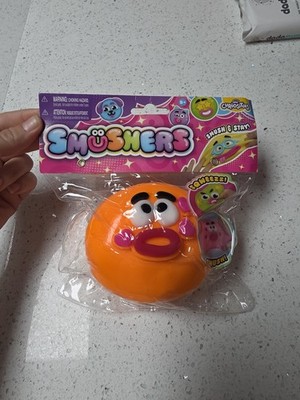 Neu in Verpackung Orb Curiosities Smushers selten orange Gesicht matschig