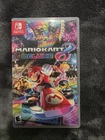 Nintendo Mario Kart 8 Deluxe and Nintendo Switch game lot.