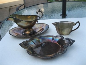 Vintage 4 pcs. silver plated gravy bowl--creamer--2 dishes
