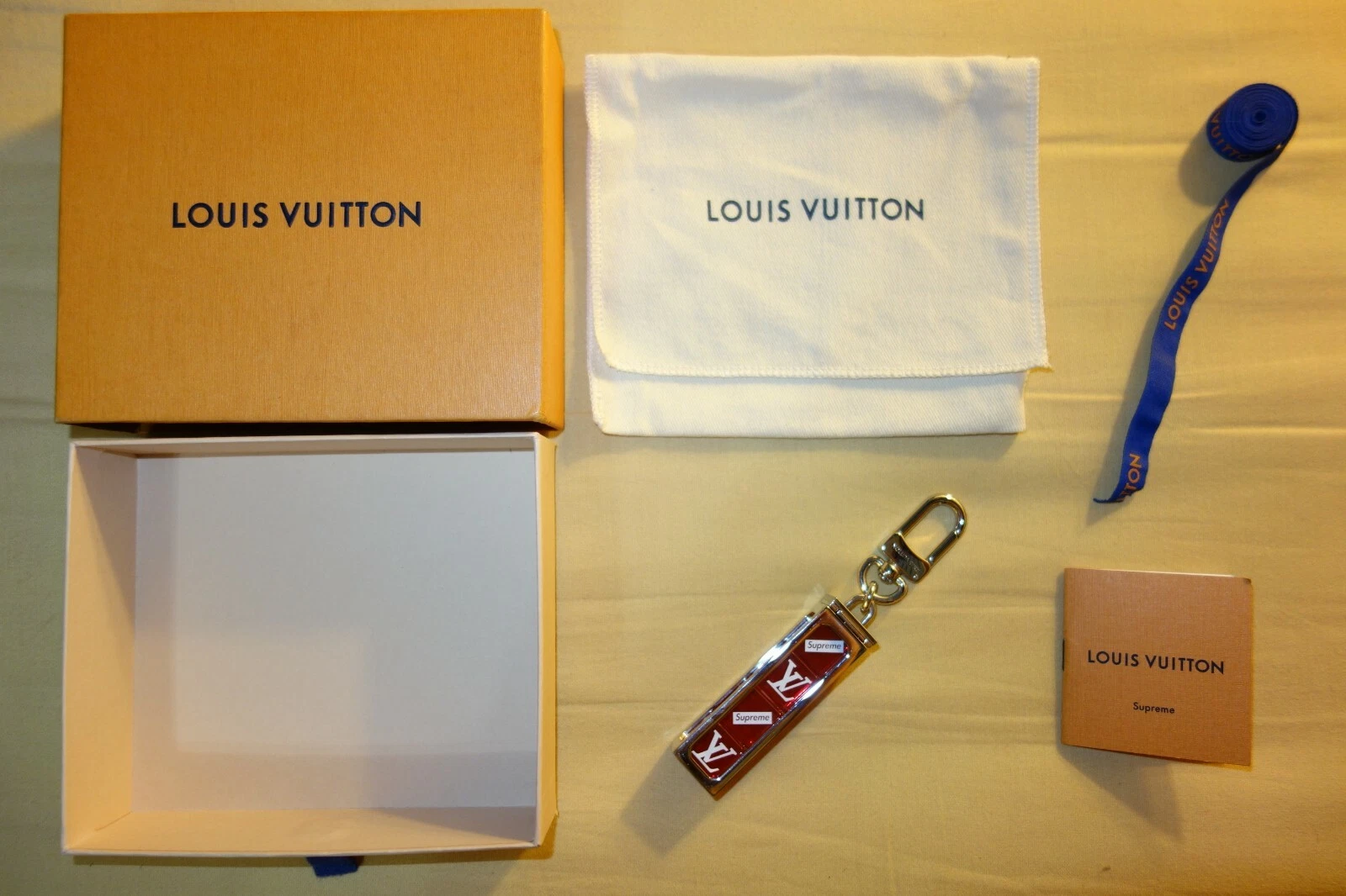 Porte clés dés Louis Vuitton x Supreme automne hiver 2017 « rouge/argent » 