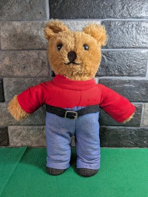 Süßer Teddybär in klassischer Kleidung im Rupert-der-Bär-Stil