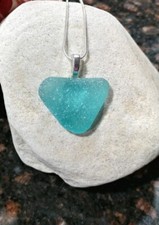 Blue seaglass pendant: Heart shaped on 20" S.S.chain.