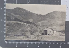 Vintage Velox B&W RPPC Postcard Home Homestead Pretty Woman Posing Log Cabin