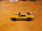 Hot Wheels Redline 1975 Mustang Stocker Yellow w/Black Interior Orange Magenta