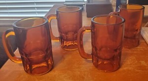 SET OF 4 RARE ANTIQUE BEER MUG/STEINS AMBER COLOR  HEAVY GLASS