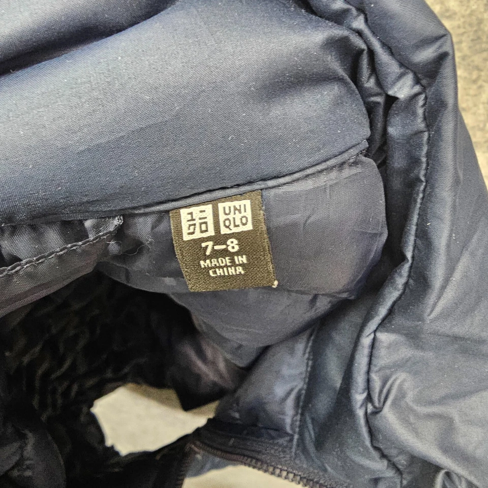 Chaleco acolchado UNIQLO para niños 7 8 azul marino ultra ligero al aire libre cremallera completa Normcore Foto 3 de 4