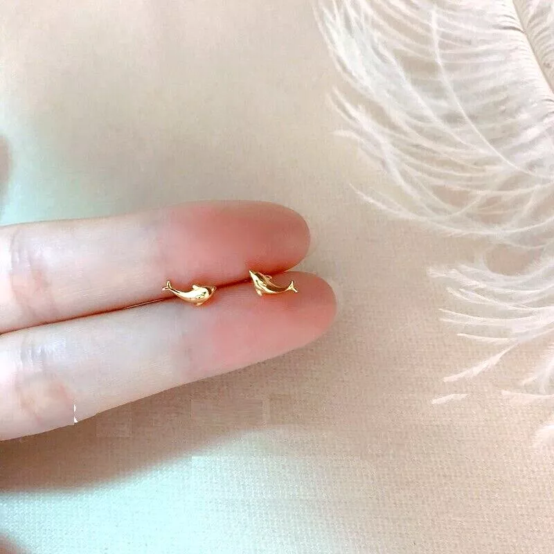Fish earrings sales studs