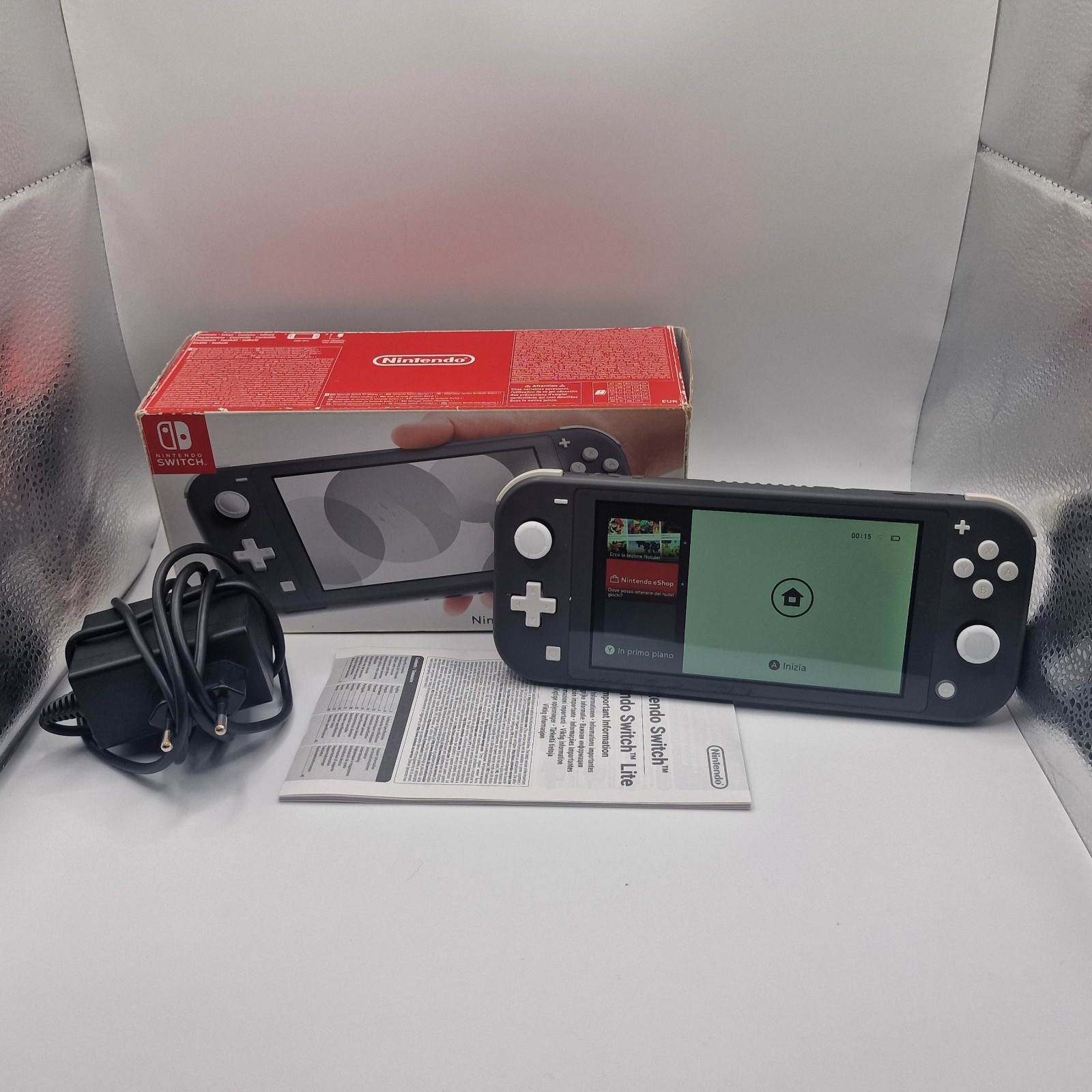 Console Nintendo Switch Lite Grise 32 Go excellent état + chargeur boite