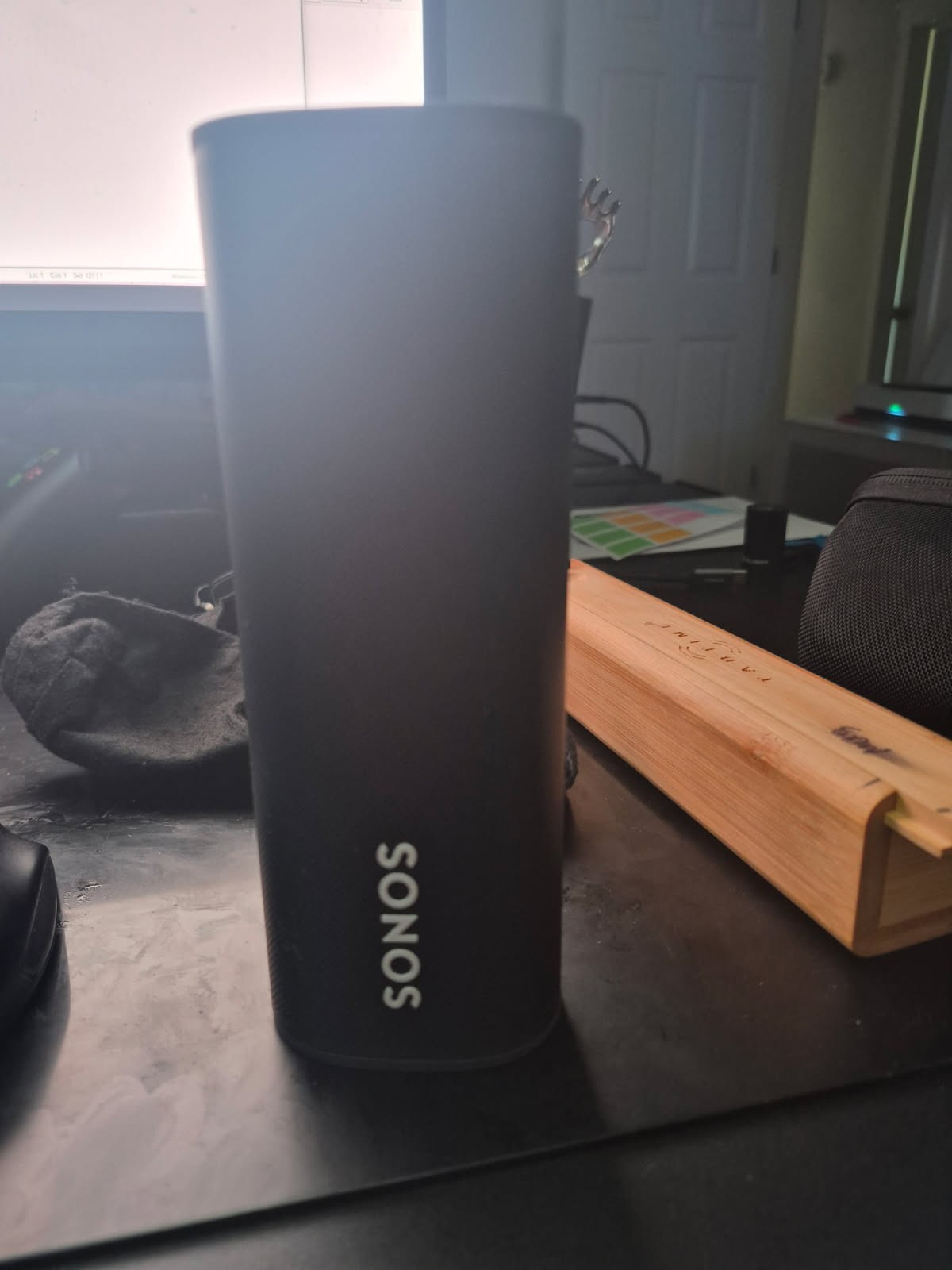 Black Sonos Roam 1 with case