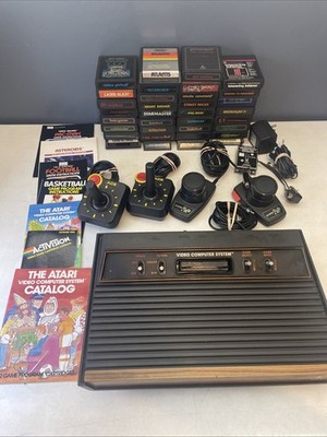 Atari 2600 Console Bundle Controllers, Paddles, 34 Games Donkey Kong, Pac-Man ET