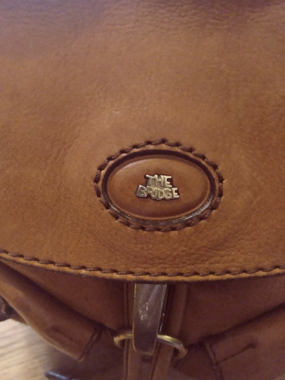 THE BRIDGE handcrafted tan leather backpack brass hardware adjustable straps — image 3