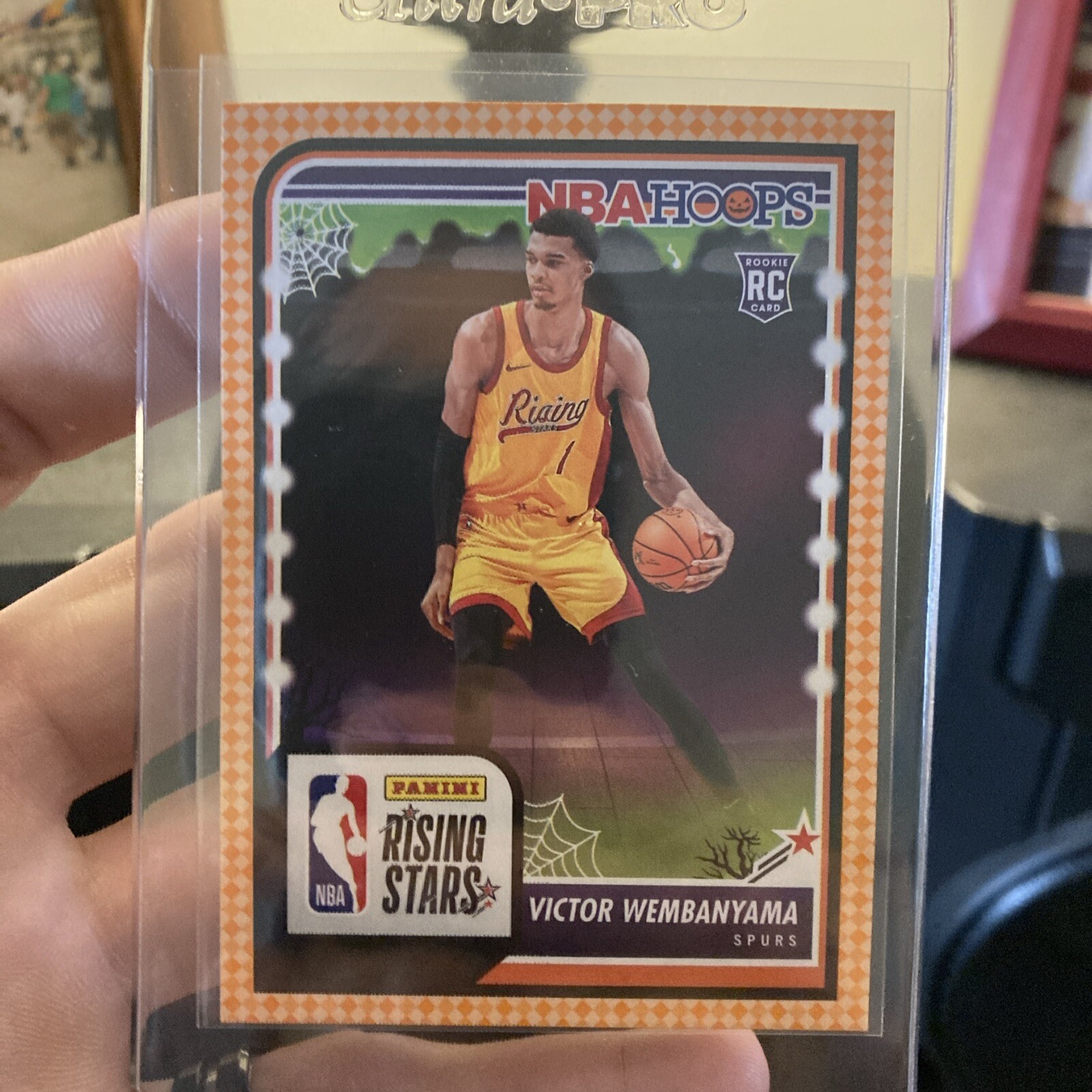 2023-24 NBA Haunted Hoops Victor Wembanyama RC Rising Stars Orange #282 Spurs