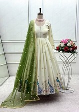 Presenting Cream Pure Dola Silk Gown Bottom With Dupatta For Functional Wear