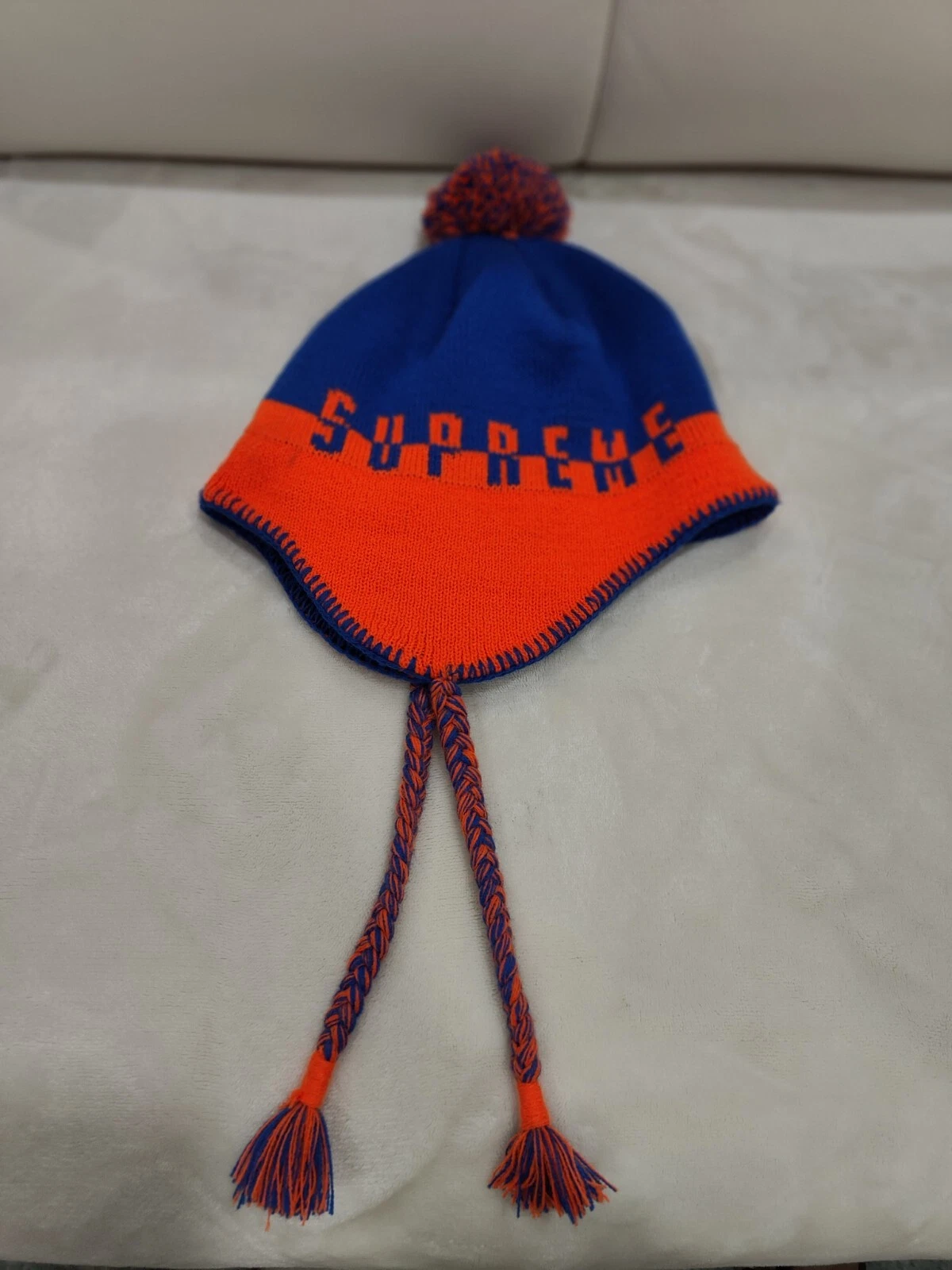 Beanie lambeau d'oreille logo Supreme Split   orange et bleu 