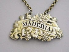 George III Cast Silver Gilt "Two Putti With Jug & Bottle" Wine Label 'Madeira'