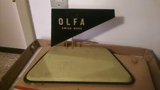 OLFA Swiss made orologi espositore da banco pubblicitario anni 60