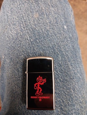 Vintage 1969 Zippo Lighter REDDY KILOWATT Electric Cartoon Character MINT Unlit