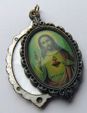 Medaglia scorrimento. Ciondolo religioso sacro cuore Gesù Madonna