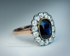 Genuine Blue Sapphire 2.50CT Oval Cut Vintage Halo Woman Ring 14K 2-Tone Gold FN