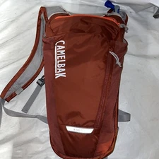 CamelBak Rogue Light Bike Style Hydration Pack 70 Ounce Fired Brick/Koi A57-5