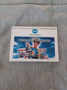 Vintage 2004 Konica Minolta Products & Promotions Spiral Bound Booklet 