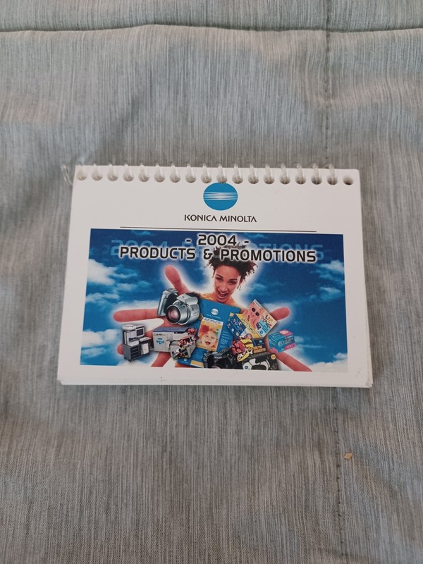 Vintage 2004 Konica Minolta Products & Promotions Spiral Bound Booklet 